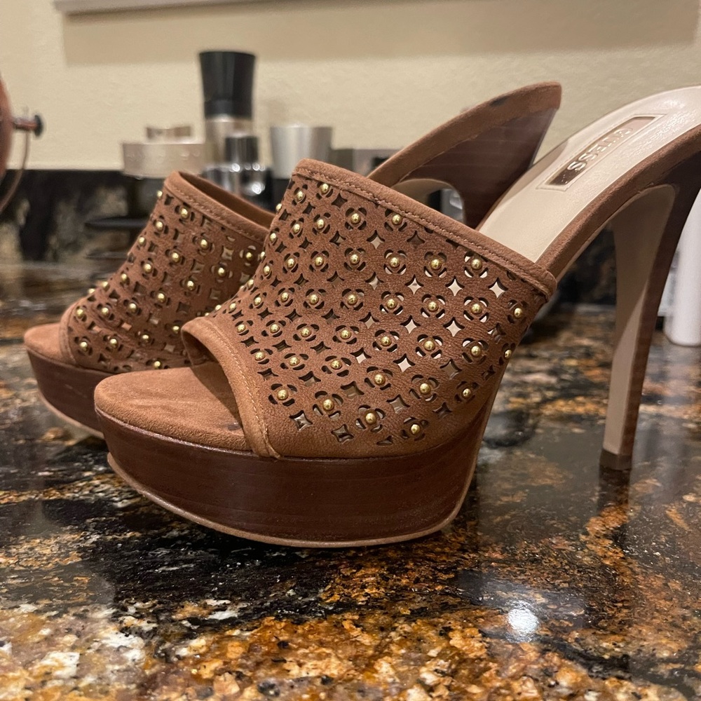 Guess high high mule lightly used maybe 1-2 times